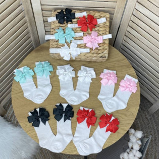 Милий комплект для дівчинки пов'язка і гольфи з бантиком