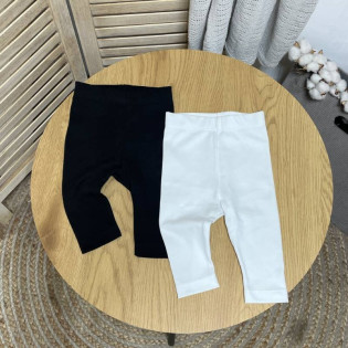 Набір для новонародженої дівчинки з двох базових лосин білого та чорного кольорів